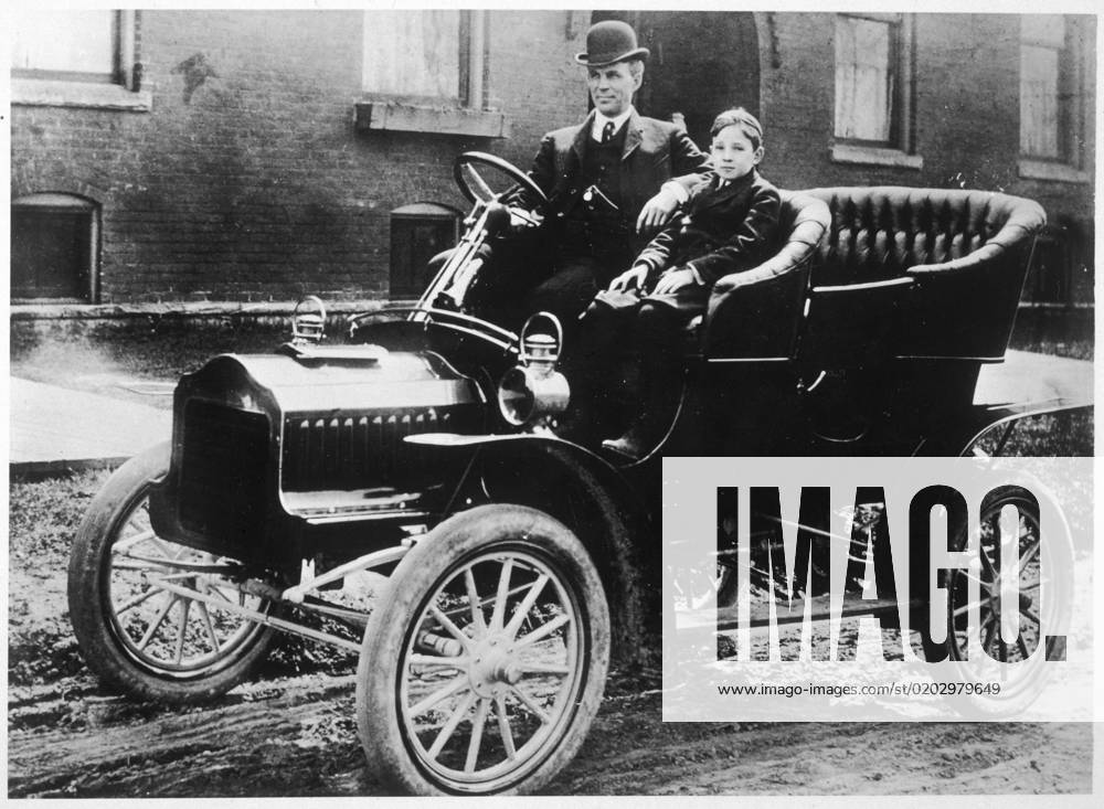 Henry Ford in Model T Ford Motor Car Henry Ford, the American motor manufacturer, with his son Edsel in one of the many versions of the Model T. Date: circa 1912