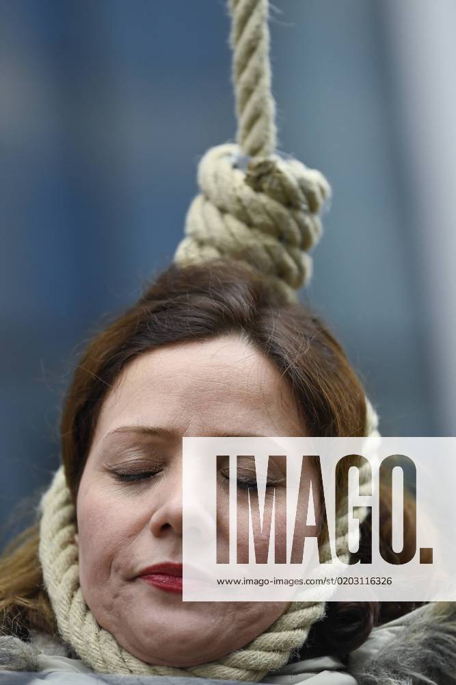 People gather for a protest to support the Iranian resistance movement, Monday 20 February 2023 in Brussels. ERICxLALMAND 60456336