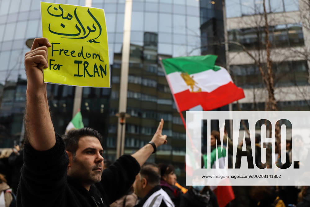 A demonstrator holds a sign reading Freedom for Iran during a protest in support of Iranian resistance movement on the sidelines of a meeting of foreign affairs ministers at the European Union headquarters in Brussels, Belgium, February 20, 2023. Brussels Belgium - ZUMAm177 20230220_zip_m177_013