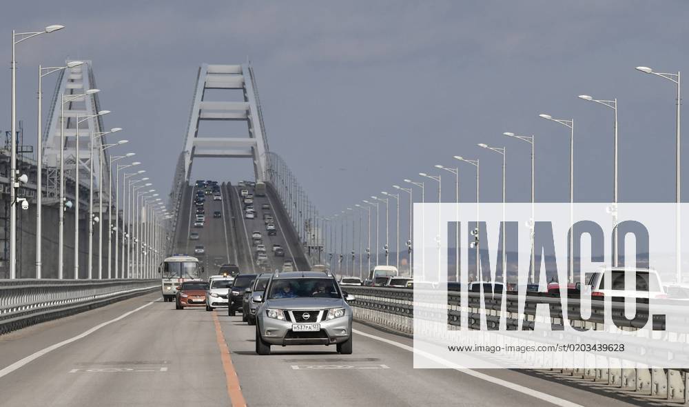 Russia Crimean Bridge Accident Reopening 8376401 23.02.2023 Cars drive on the Crimean Bridge, which is open to traffic on all lanes, in Kerch, Crimea, Russia. The Crimean Bridge is fully open for car traffic on all lanes, restoration work was completed one and a half months ahead of schedule. Konstantin Mihalchevskiy Sputnik Kerch Republic of Crimea Russia