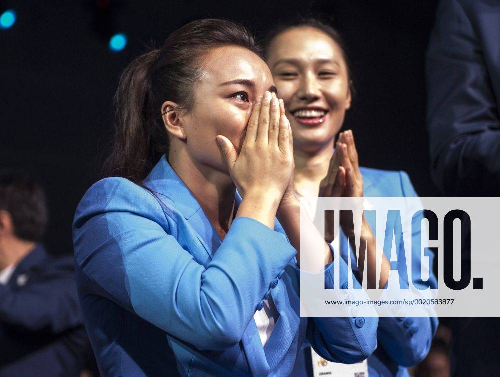 (150731) -- KUALA LUMPUR, July 31, 2015 -- Li Nina, memeber of Beijing 2022 Olympic Winter games Winterspiele Spiele Summer games bid delegation reacts after Beijing won the bid at the 128th International Olympic Committee session in Kuala Lumpur, Malaysia, Friday, July 31, 2015. ) (SP)MALAYSIA-KUALA LUMPUR-IOC-2022 WINTER OLYMPICS-BEIJING LuixSiuxWai