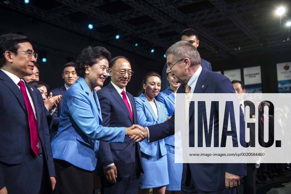 (150731) -- KUALA LUMPUR, July 31, 2015 -- President of the International Olympic Committee (IOC) Thomas Bach (R) shakes hands with Liu Yandong, Chinese Vice Premier and head of Beijing 2022 Winter Olympics bid Delegation, after Beijing won the bid at the 128th International Olympic Committee session in Kuala Lumpur, Malaysia, Friday, July 31, 2015. ) (SP)MALAYSIA-KUALA LUMPUR-IOC-2022 WINTER OLYMPICS-BEIJING LuixSiuxWai