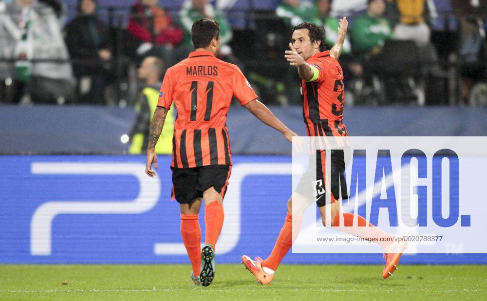 SOCCER - CL play off, Rapid vs Shakhtar VIENNA,AUSTRIA,19.AUG.15 - SOCCER - UEFA Champions League, play off, SK Rapid Wien vs FC Shakhtar Donetsk. Image shows the rejoicing of Darijo Srna (Shakhtar) and Marlos (Shakhtar). Keywords: Wien Energie. GEPAxpictures xPhilippxBrem
