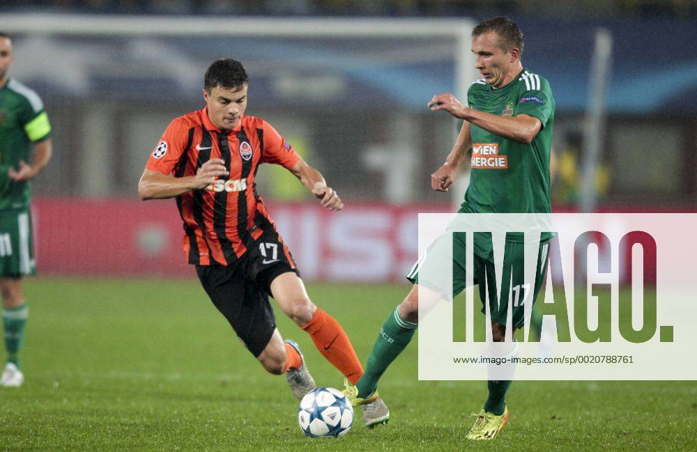 SOCCER - CL play off, Rapid vs Shakhtar VIENNA,AUSTRIA,19.AUG.15 - SOCCER - UEFA Champions League, play off, SK Rapid Wien vs FC Shakhtar Donetsk. Image shows Maksym Malyshev (Shakhtar) and Christopher Dibon (Rapid). Keywords: Wien Energie. GEPAxpictures xPhilippxBrem