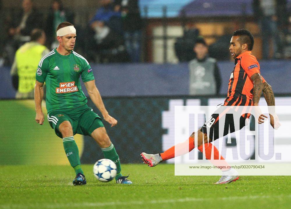 SOCCER - CL play off, Rapid vs Shakhtar VIENNA,AUSTRIA,19.AUG.15 - SOCCER - UEFA Champions League, play off, SK Rapid Wien vs FC Shakhtar Donetsk. Image shows Srdjan Grahovac (Rapid) and Alex Teixeira (Donetsk). Keywords: Wien Energie. GEPAxpictures xChristianxOrt