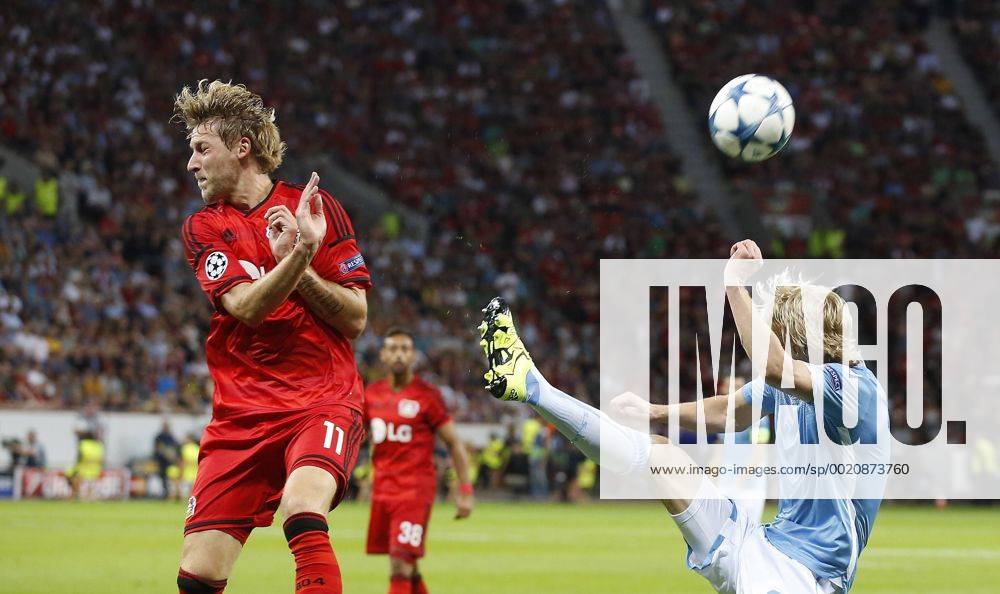 Stefan Kießling (Bayer 04 Leverkusen) (L) against Dusan Basta (Lazio Rom) during the Championsleague Qualification between Bayer 04 Leverkusen and Lazio Rom, Bayarena in Leverkusen on August 26., 2015. Bayer 04 Leverkusen vs. Lazi Rom in der Qualifikation der Champions League der Saison 2015 2016 am 26. August 2015.