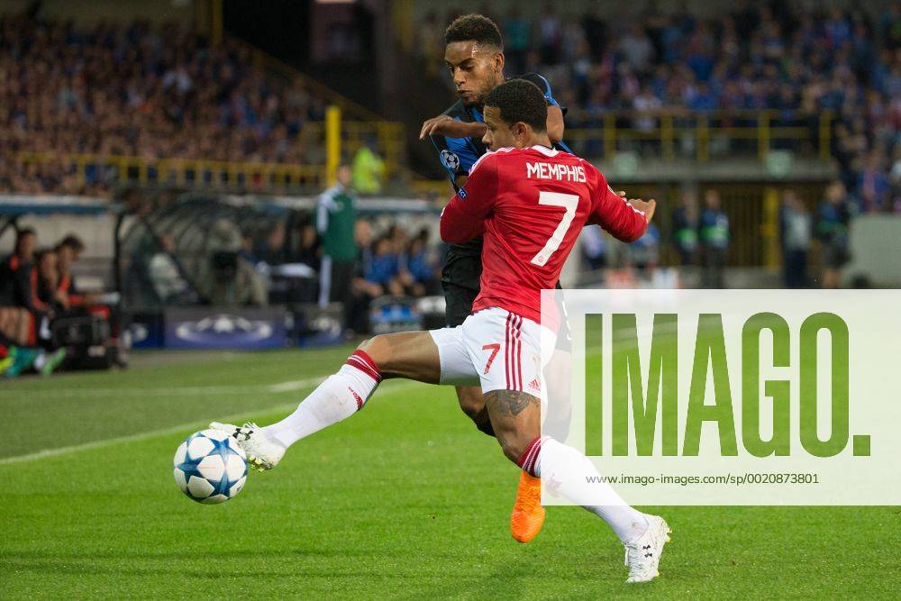- BRUGGE, BELGIUM: Club s Jean-Charles Castelletto and Manchester s Memphis Depay fight for the ball during a soccer game between Belgian first league team Club Brugge KV and British club Manchester United ManU FC in Brugge, Wednesday 26 August 2015, the return game of the play-offs of the UEFA Champions League competition. Manchester United won the first leg 3-1. KURTxDESPLENTER x04687486x