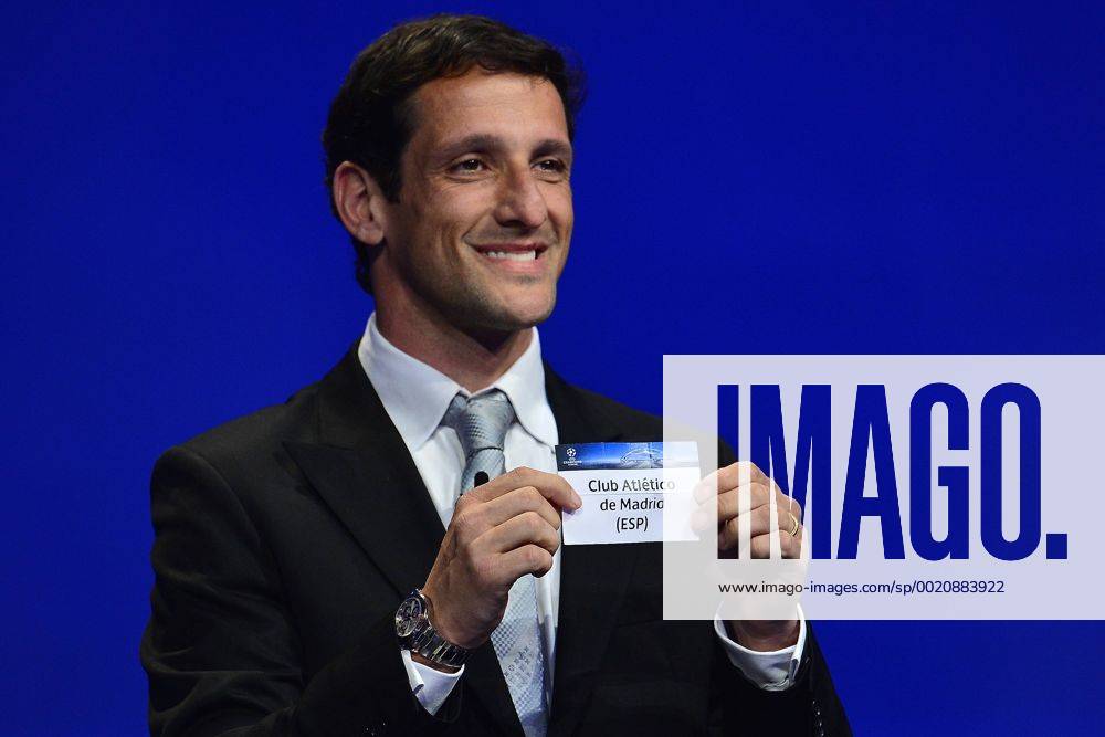 Aug. 27, 2015 - Monaco, Monaco - JULIANO BELLETTI ex Barcelona soccer player shows the draw result of Club Atletico de Madrid during the UEFA Champions League Draws 2015 - 16 at Grimaldi Forum. Soccer 2015 - UEFA Champions League 2015 - 16 Draw - ZUMAm119