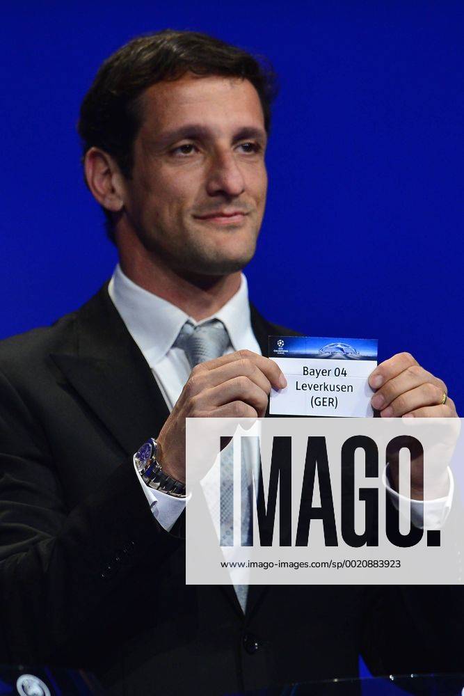 Aug. 27, 2015 - Monaco, Monaco - JULIANO BELLETTI ex Barcelona soccer player shows the draw result of Bayern Leverkusen during the UEFA Champions League Draws 2015 - 16 at Grimaldi Forum. Soccer 2015 - UEFA Champions League 2015 - 16 Draw - ZUMAm119