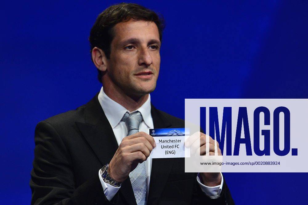 Aug. 27, 2015 - Monaco, Monaco - JULIANO BELLETTI ex Barcelona soccer player shows the draw result of Manchester United ManU FC during the UEFA Champions League Draws 2015 - 16 at Grimaldi Forum. Soccer 2015 - UEFA Champions League 2015 - 16 Draw - ZUMAm119