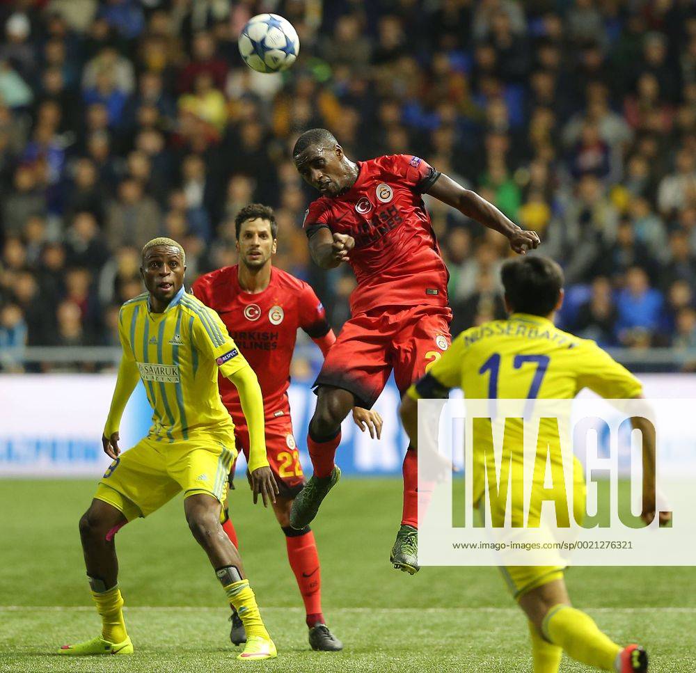 UEFA Champions League Group C football match between Astana and Galatasaray at Astana Arena in Astana, Kazakhstan, 30 September 2015 Final Score: Astana 2 - Galatasaray 2 Pictured: Junior Kabananga 89 of Astana and Lionel Carole and Hakan Balta of Galatasaray