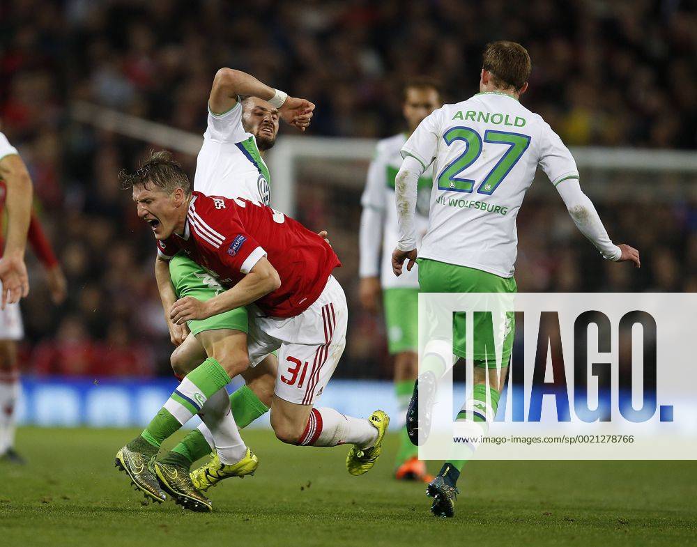 Daniel Caligiuri of Wolfsburg brings down Bastian Schweinsteiger of Manchester United ManU - UEFA Champions League - Group B - Manchester Utd vs Vfl Wolfsburg - Old Trafford Stadium - Manchester - England - 30th September 2015 - Picture Simon Bellis Sportimage .