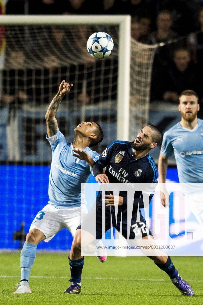 , 150930 Malmö FFs Victor Yoshimar Yotun Flores och Real Madrids Isco during UEFA CHAMPIONS LEAGUE 2015 2016 match between Malmö FF and Real Madrid..