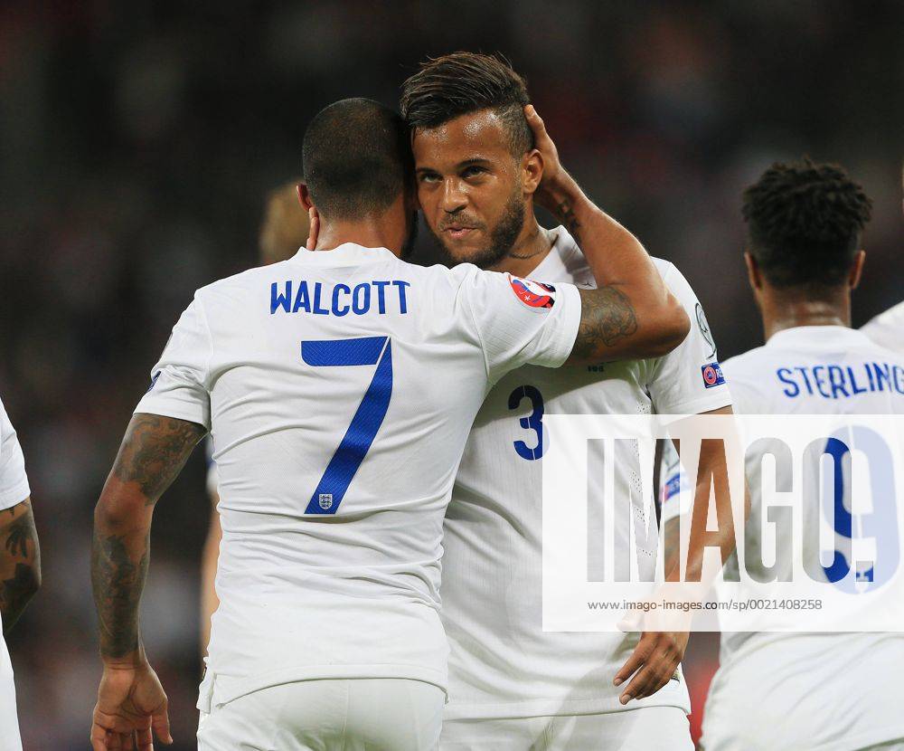 England s Theo Walcott celebrates scoring his sides opening goal with Ryan Bertrand Euro 2016 Qualifier- England vs Estonia - Wembley Stadium - England - 9th October 2015 - Picture David Klein Sportimage .