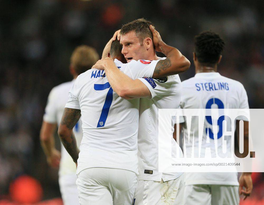 England s Theo Walcott celebrates scoring his sides opening goal with James Milner Euro 2016 Qualifier- England vs Estonia - Wembley Stadium - England - 9th October 2015 - Picture David Klein Sportimage .