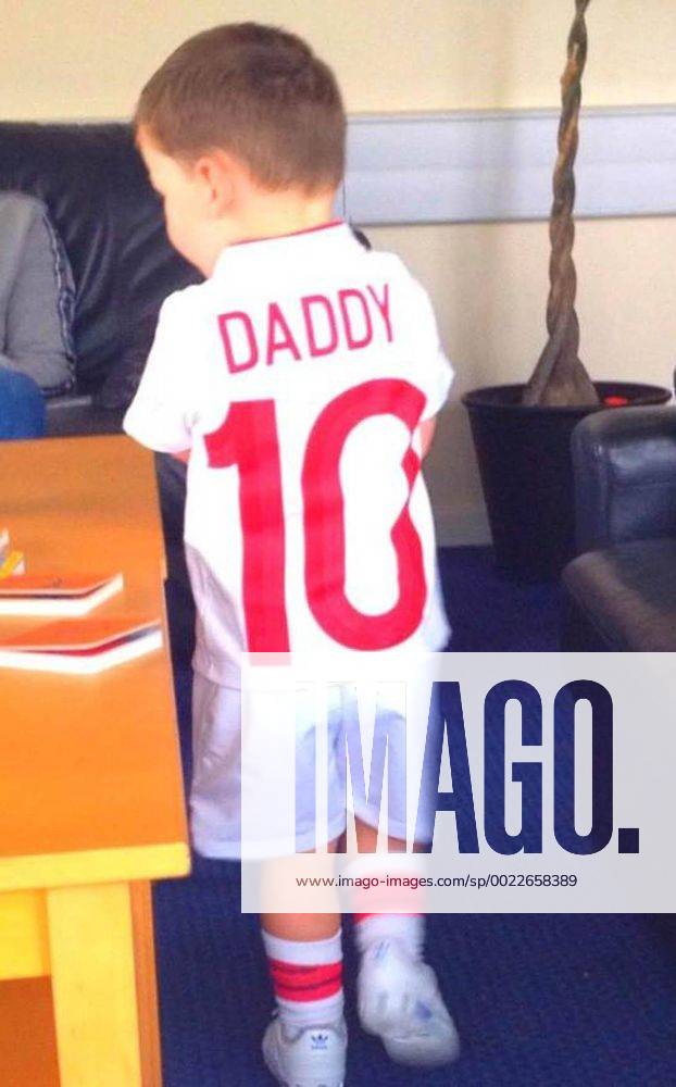 Liverpool, Merseyside, United Kingdom - KAI ROONEY, the son of England striker W. Rooney, leaving Liverpool John Lennon Airport en route to Poland for the Euros, wearing a football shirt with Daddy on the back as he boards a private plane with mum and England WAG Coleen Rooney. Rooney Family Leaves For Euro Match In Poland - ZUMAm23_