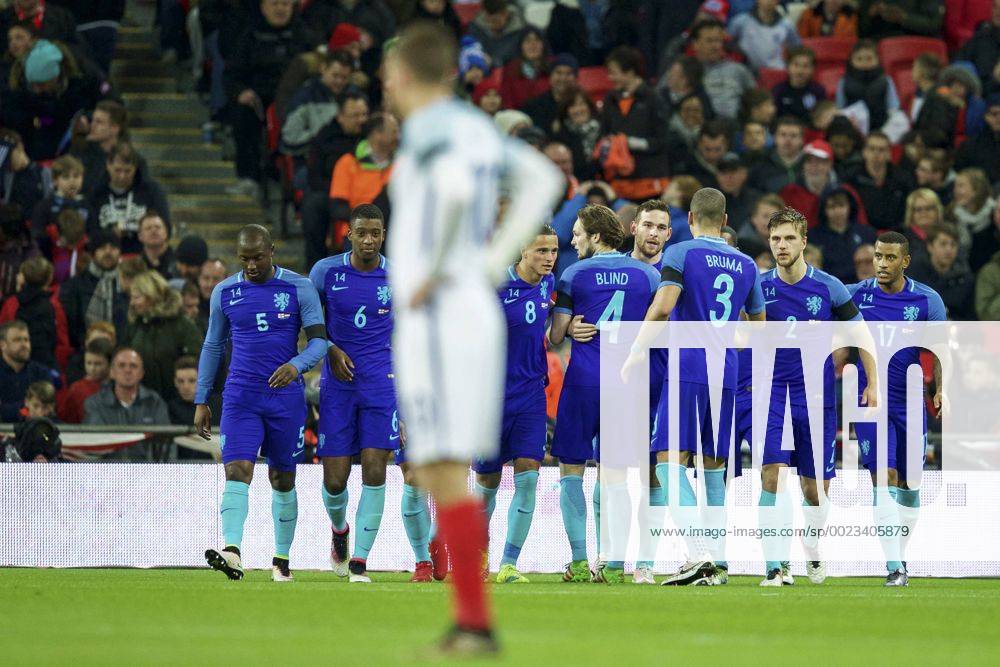 (L-R) Jetro Willems of Holland, Riechedly Bazoer of Holland, Jamie Vardy of England, Ibrahim Afellay of Holland, Daley Blind of Holland, Vincent Janssen of Holland, Jeffrey Bruma of Holland, Joel Veltman of Holland, Luciano Narsingh of Holland Maurice van Steen London England v Netherlands IVx 5233694