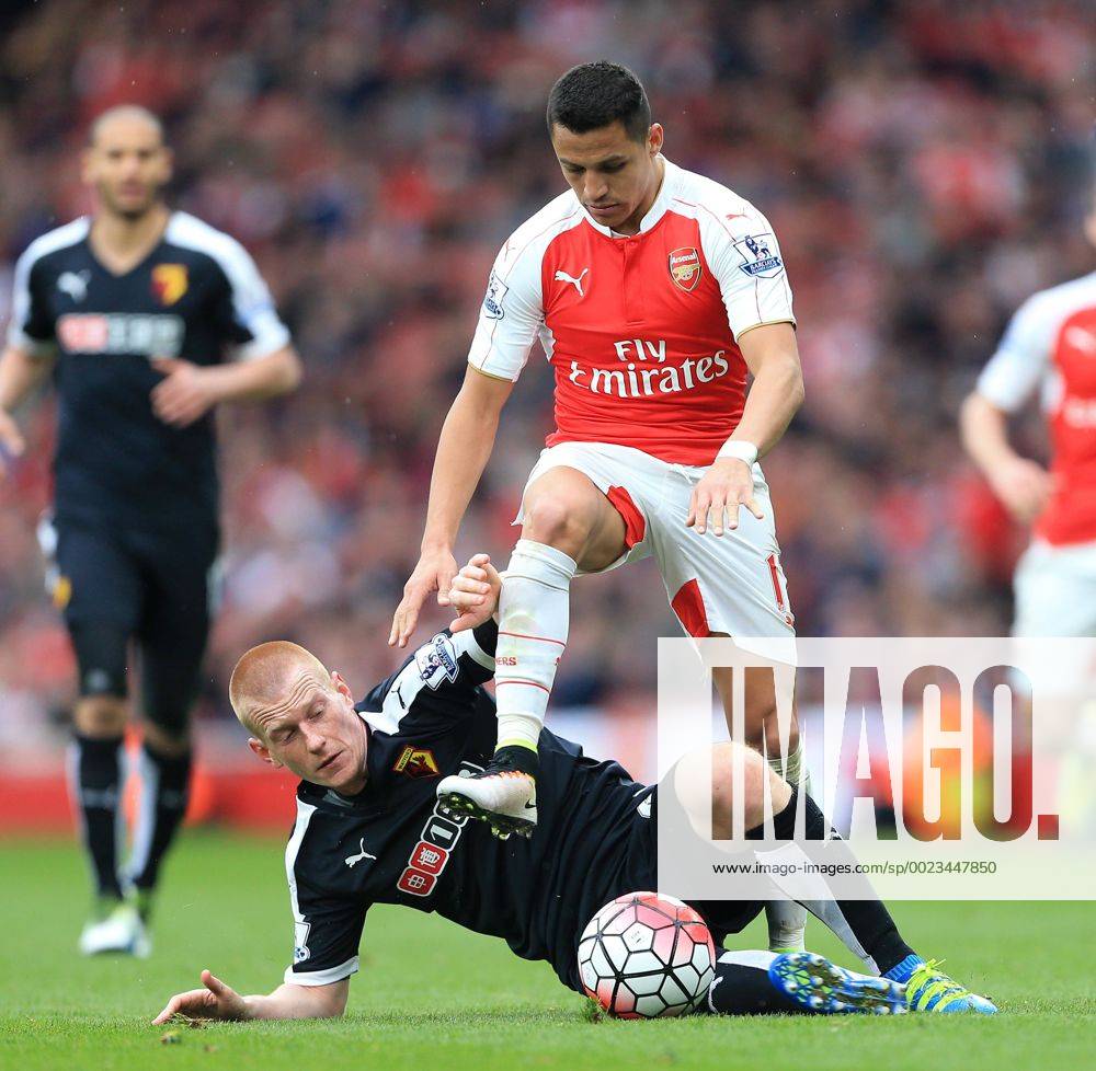 Arsenal s Alexis Sanchez tussles with Watford s Ben Watson during the Premier League match at Emirates Stadium. Photo credit should read: David Klein Sportimage .