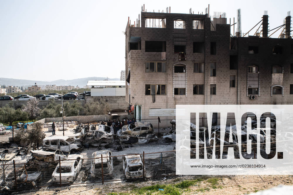 Burned cars and sooted Palestinian house facade which was set on fire by Jewish settlers. Following a terror attack on Sunday in which two Israelis were killed by a Palestinian gunman, hundreds of Jewish settlers pursued revenge in the village of Hawara in a violent rampage. Hundreds of Palestinian cars were torched and over 30 buildings were set on fire. The event is referred to in Israel as the Hawara Pogromâ Hawara Palestine - ZUMAs197 20230228_zaa_s197_240