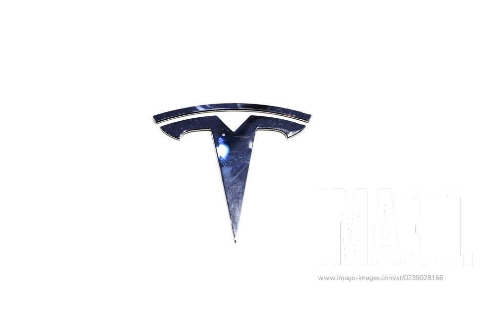 Lucid Motors And Tesla Motors Shows His Newest Technologies In The Mobile World Congress 23 BARCELONA, SPAIN - MARCH 11: The Tesla emblem and logo on a Tesla Model S, the newest model of the S series of the American multinational automotive and clean energy company, exhibited during the Mobile World Congress 2023 on March 11, 2023, in Barcelona, Spain. Barcelona Catalonia Spain