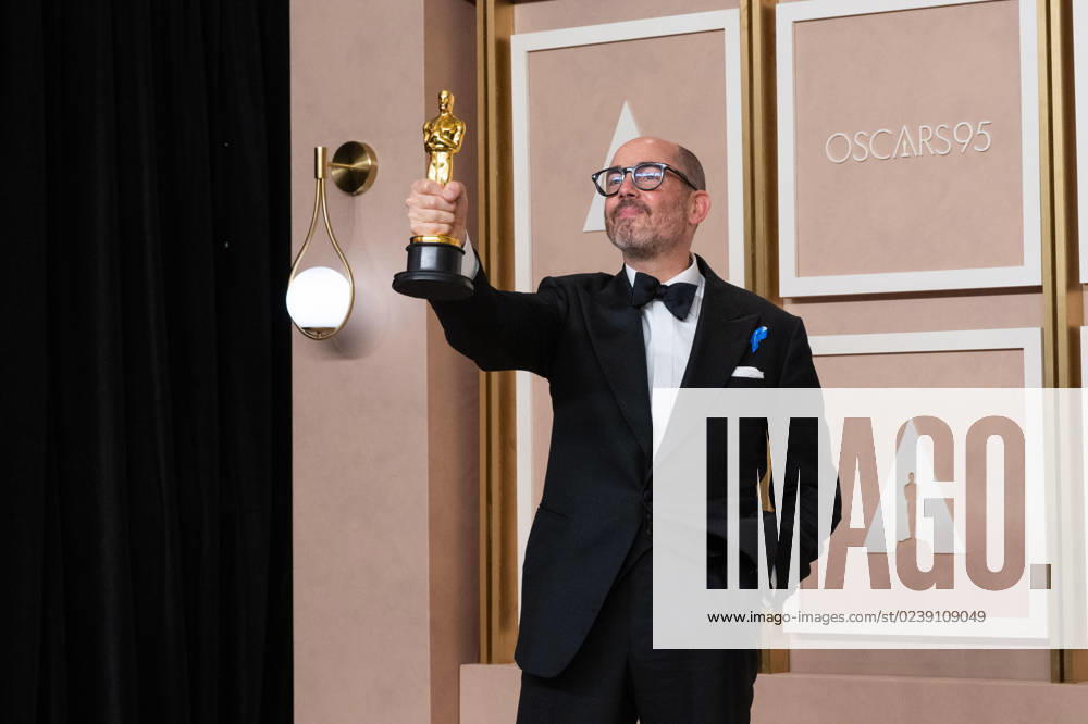 Edward Berger poses backstage with the Oscar® for International Feature FIlm during the live ABC telecast of the 95th Oscars® at Dolby® Theatre at Ovation Hollywood on Sunday