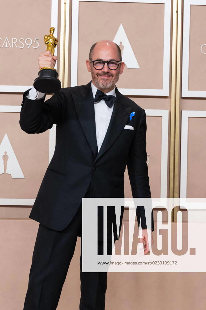 Edward Berger poses backstage with the Oscar® for International Feature FIlm during the live ABC telecast of the 95th Oscars® at Dolby® Theatre at Ovation Hollywood on Sunday