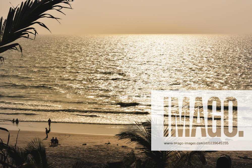 Panorama landscape view of a beautiful tropical sea beach in sunset time during christmas holiday. ( MUMBAI, MAHARASTRA, INDIA). Travel vacation and holiday concept. , 27404338.jpg, silhouette, vacation, sunrise, resort, summer, sun, sky, paradise, palm-tree, travel, coconut, orange, nature, exotic, dusk, trees, yellow, island, ocean, evening, background, light, twilight, sunlight, scenery, tranquil, scene, water, leaf, sundown, golden, caribbean, maldives, tropic, coastal-sand, thailand, holiday, colorful, shore-coast, asia, lagoon, miami, hawaii, islands, bali, morning, lucia, bahamas, jamaica, wave,