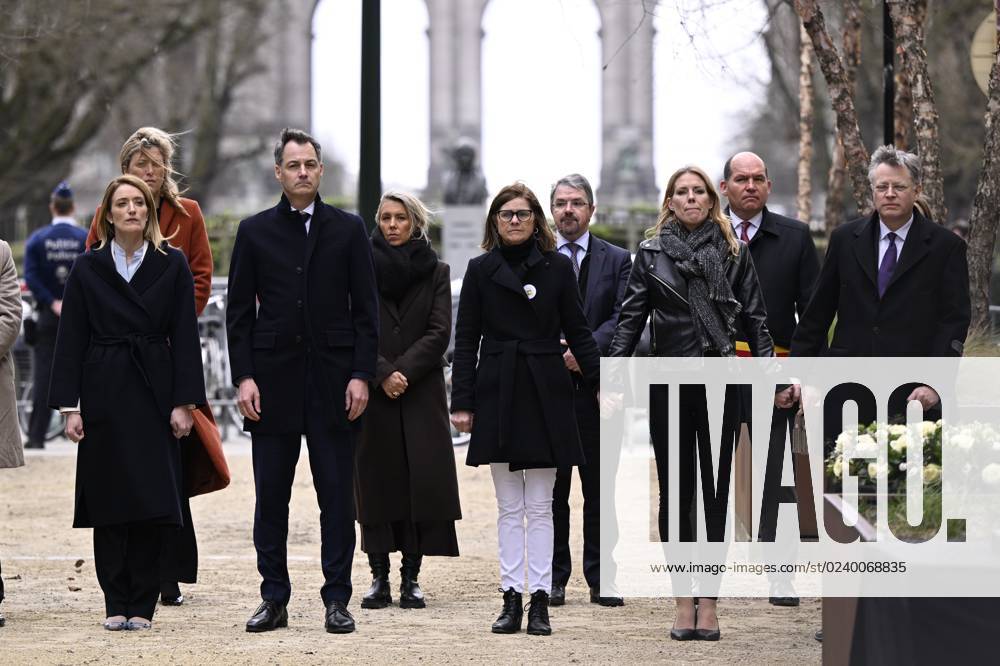 European Parliament chairwoman Roberta Metsola (L) and Prime Minister Alexander De Croo (2L) pictured during a ceremony at the memorial monument in the Brussels Wetstraat rue de la Loi to commemorate the 2016 terrorist attacks in Brussels, Wednesday 22 March 2023. On March 22 2016, 32 people were killed and 324 got injured in suicide bombings at Zaventem national airport and Maalbeek Maelbeek metro station, which were claimed by ISIL. LAURIExDIEFFEMBACQ 63497714