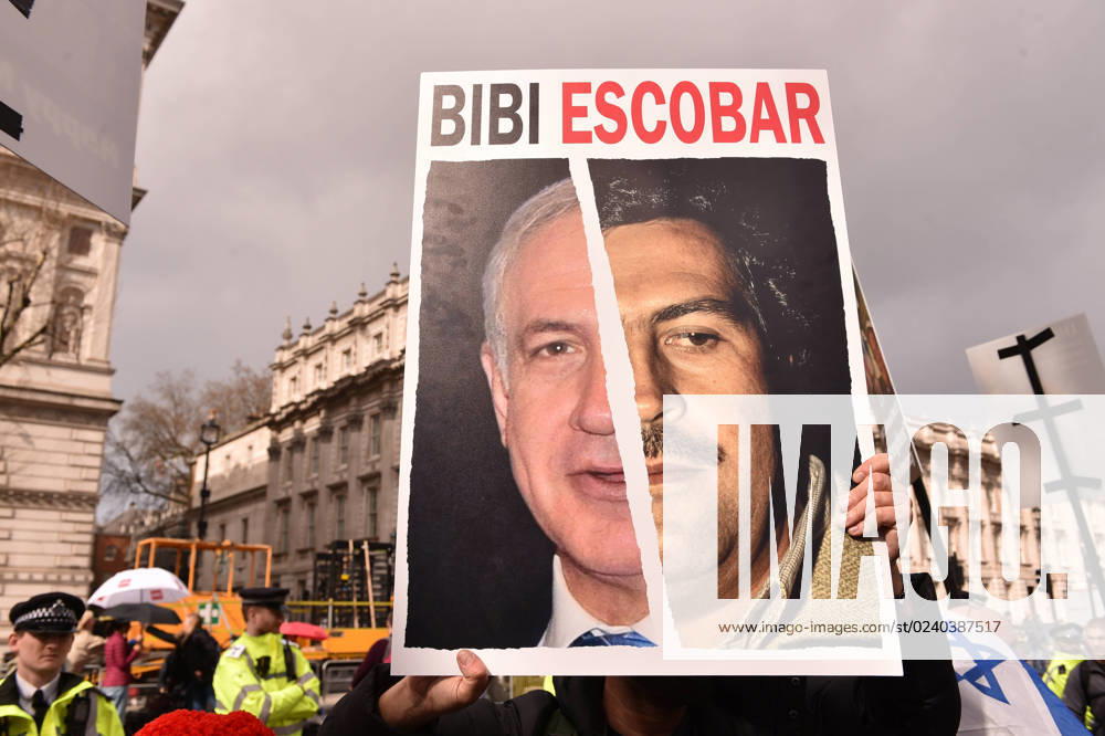 A poster showing half Netanyahu and half Pablo Escobar. Hundreds of protesters rallied outside Downing Street to oppose the arrival of Israeli Prime Minister Benjamin Netanyahu in London. London United Kingdom - ZUMAk172 20230324_zip_k172_008