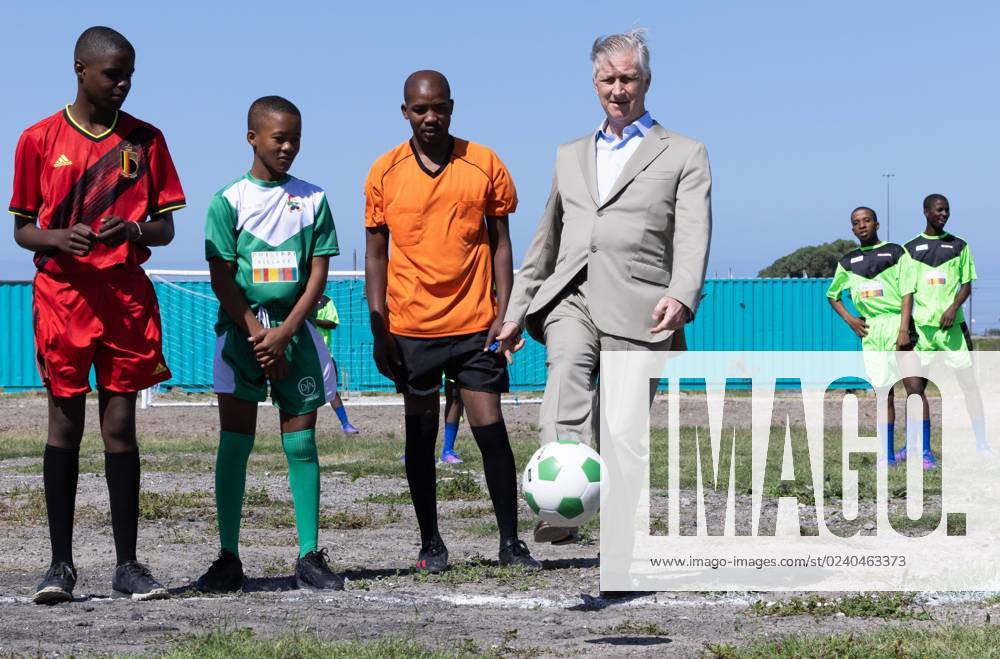 King Philippe - Filip of Belgium pictured during a visit to the Philippi Village with several activities, Close the gap, Assitej, Soccer pitch, Mural, part of a state visit of the Belgian Royal Couple to the Republic of South Africa, in Cape Town, Sunday 26 March 2023. BENOITxDOPPAGNE 63703219