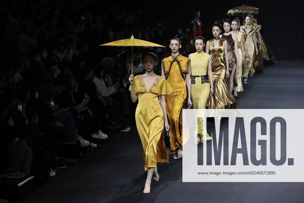 Models walk the runway at Dingfei collection show by Chinese designer Ding Fei on day four of the China International Fashion Week A W 2023 at 751D.PARK on March 27, 2023 in Beijing, China.