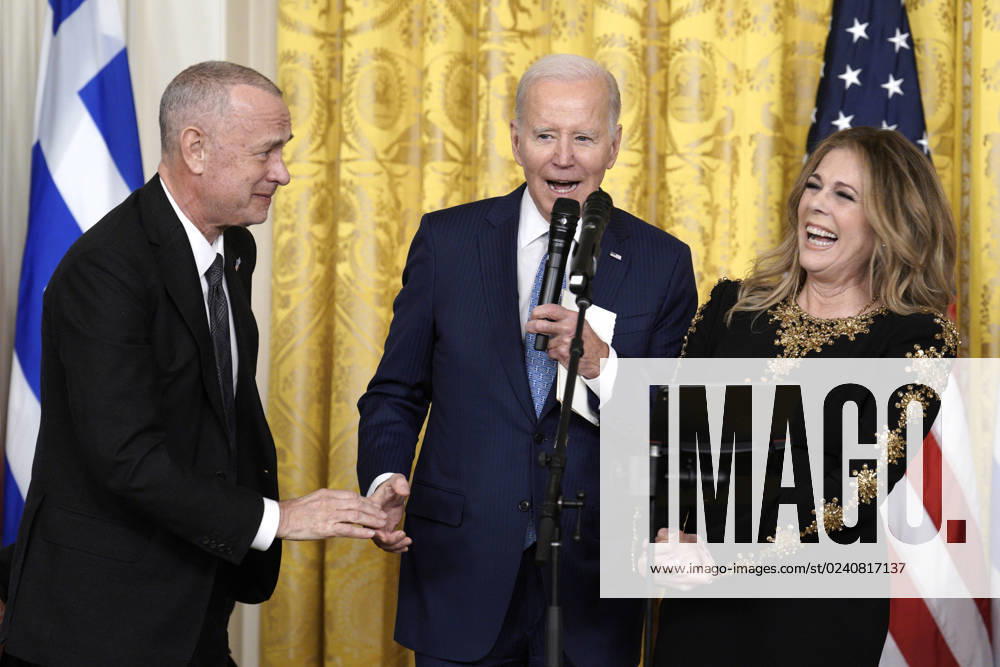 Actor Tom Hanks and his wife Rita Wilson react as United States President Joe Biden hosts a reception celebrating Greek Independence Day in the East Room at the White House in Washington on March 29, 2023 Washington USA - ZUMAs152 20230329_zaa_s152_132