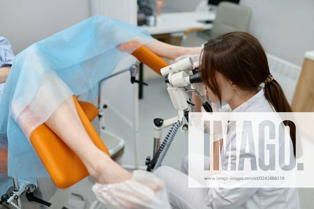 Gynecologist examining patient on chair with gynecological equipment, A doctor doing gynecological examination of female patient on chair with gynecological microscope, A doctor doing gynecological examination of female patient on chair with gynecological microscope, 30.03.2023,