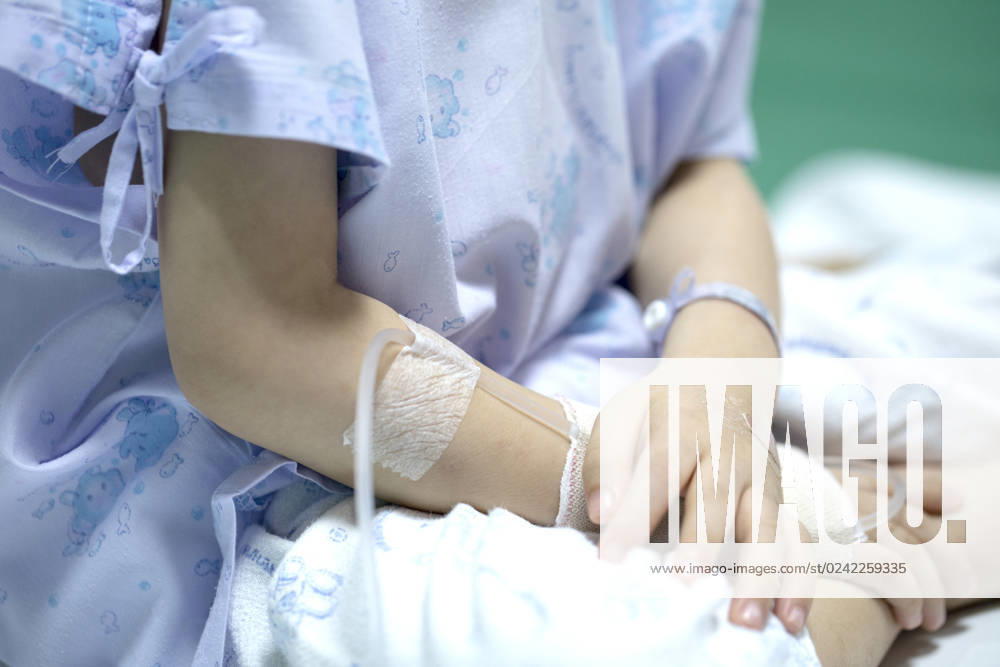 Sick child on a receiving a saline solution in hospital , 31713514.jpg, asian, baby, background, bed, care, child, children, clinic, close, cold, cure, cute, doctor, drip, drug, emergency, equipment, female, girl, hand, healing, health, healthy, hospital, illness, intravenous, kid, little, medical, medicine, pain, patient, people, receiving, rest, room, saline, sick, sickness, sleeping, solution, space, surgical, treatment, up, vein, virus, white, woman, young