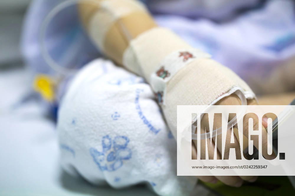 Sick child on a receiving a saline solution in hospital , 31713646.jpg, asian, baby, background, bed, care, child, children, clinic, close, cold, cure, cute, doctor, drip, drug, emergency, equipment, female, girl, hand, healing, health, healthy, hospital, illness, intravenous, kid, little, medical, medicine, pain, patient, people, receiving, rest, room, saline, sick, sickness, sleeping, solution, space, surgical, treatment, up, vein, virus, white, woman, young