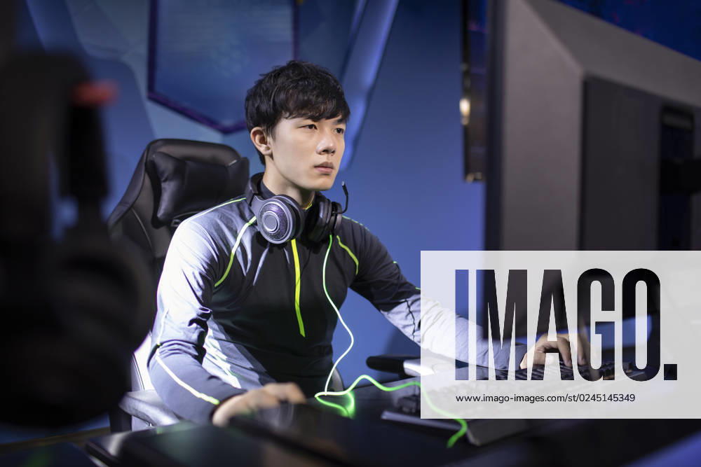 Young Chinese man playing esports Beijing China