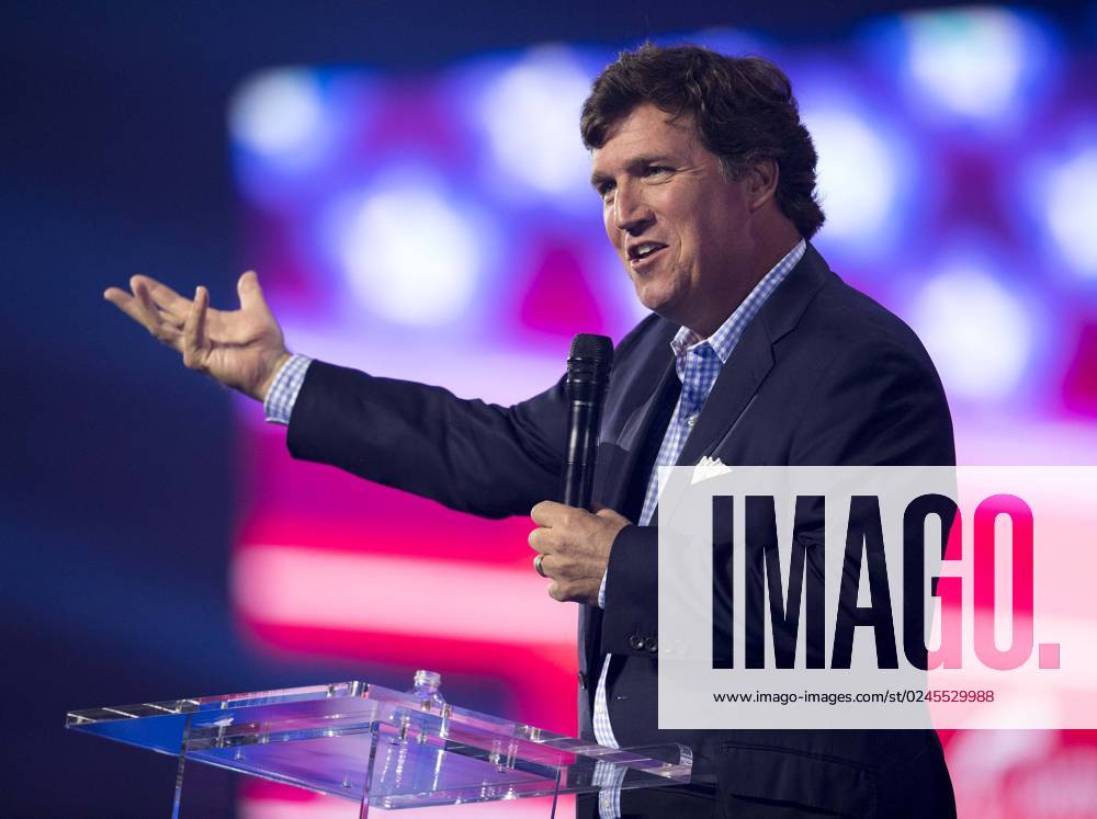 Fox News host TUCKER CARLSON speaks at Turning Point USA s AmericaFest 2022. Phoenix USA - ZUMAce6_ 20221217_zaf_ce6_019