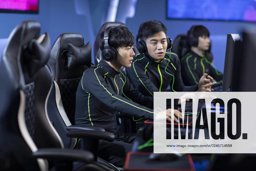 Young Chinese men playing esports Beijing China