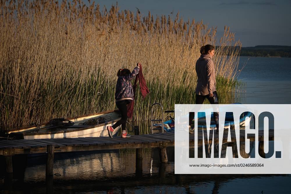 Fishing boats on Hungary s Lake Balaton at sunset on April 30, 2023. (CTKxPhoto PetrxMalina) CTKPhotoF202305040004001 CTKPhotoF202305040004001