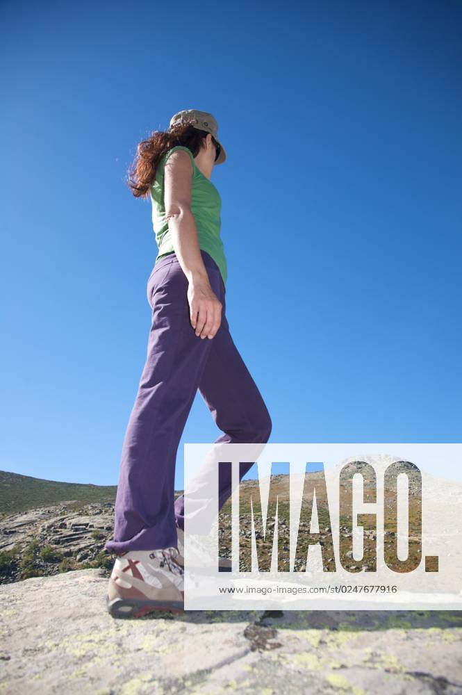 IMAGO Creative: Sommer, In den Bergen woman trekking at gredos mountains in avila spain