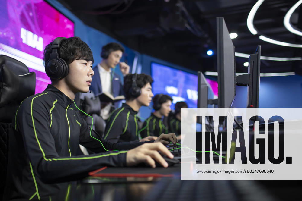 Young Chinese men playing esports Beijing China