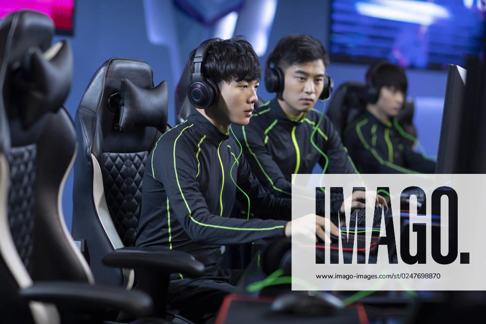 Young Chinese men playing esports Beijing China