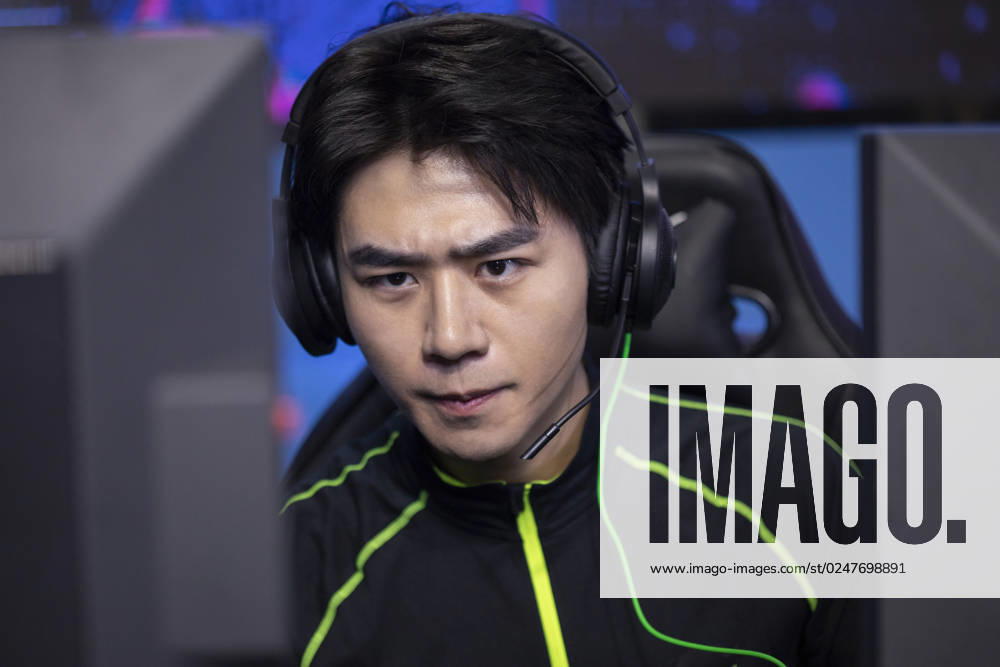 Young Chinese man playing esports Beijing China