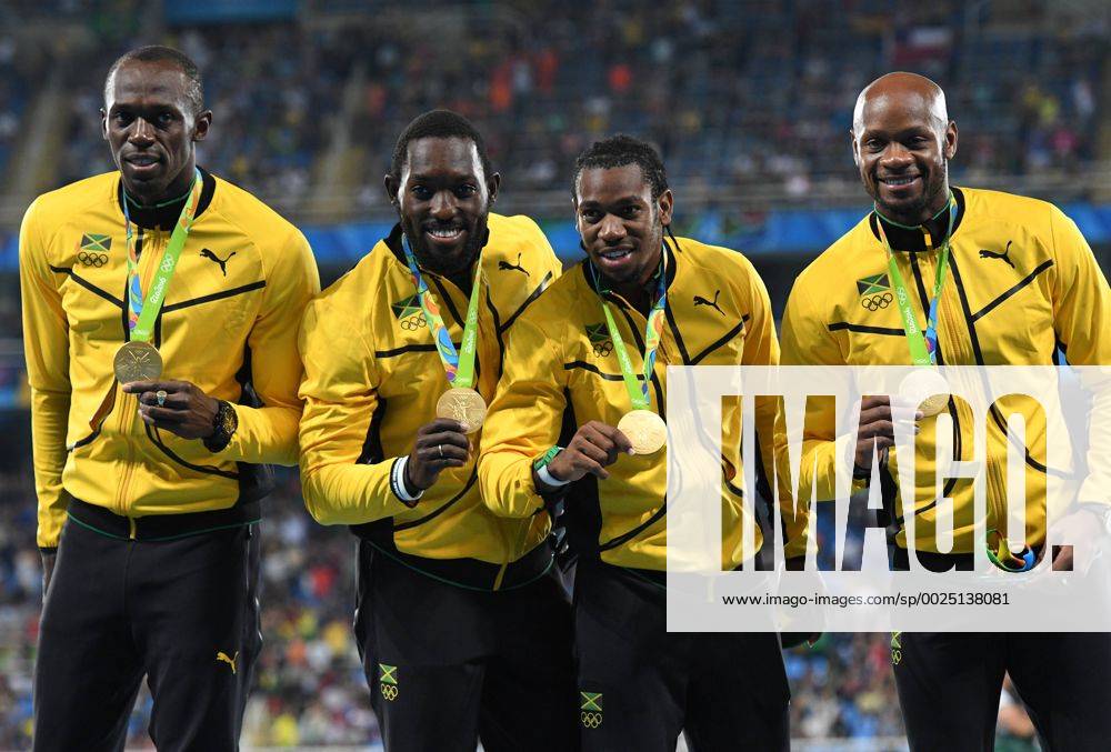 Gold medalists Asafa Powell, Yohan Blake, Nickel Ashmeade and Usain Bolt of Jamaica hold their medals at the medal ceremony for the Men s 4 x 100 meter Relay at Olympic Stadium at the 2016 Rio Summer Olympics in Rio de Janeiro, Brazil, on August 20, 2016. OLY201608201201 RICHARDxELLIS
