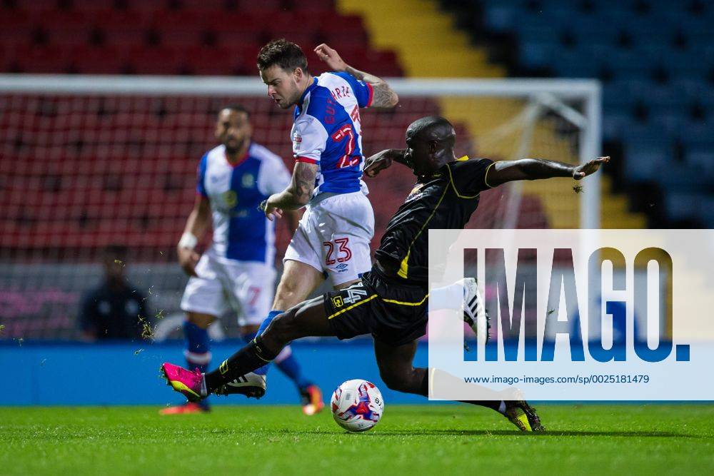 Ewood Park, Blackburn, England. EFL Cup Football. Blackburn Rovers versus Crewe Alexandra. Crewe Alexandra defender Zoumana Bakayogo tackles Blackburn Rovers midfielder Danny Guthrie. Williamsx ActionPlus11779515