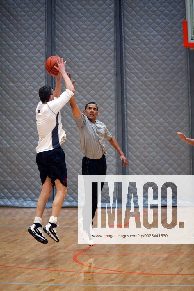 Feb 28, 2009 - Washington, District of Columbia, USA - President BARACK OBAMA plays basketball with Education Secretary ARNE DUNCAN at the U.S. Department of Interior, , 2 28 09. This photo was one of 300 pictures released by the White House on 29 April 2009 via the FLICKR website on the occasion of the completion of the first 100 days of Obama s presidency. Obama First 100 Days - ZUMAz03_