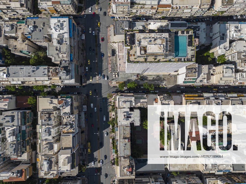 IMAGO Creative, Urban Lifestyle Aerial View Of Athens From A Drone Top down view of the roads with cars, traffic and bulding terraces. Panoramic aerial view from a drone of the urban environment of the Greek capital, Athens. Apartments, buildings and roads in central Athens near Ampelikipi and Zografou residential neighborhood area. Athens, Greece on May 20, 2023 Athens Greece