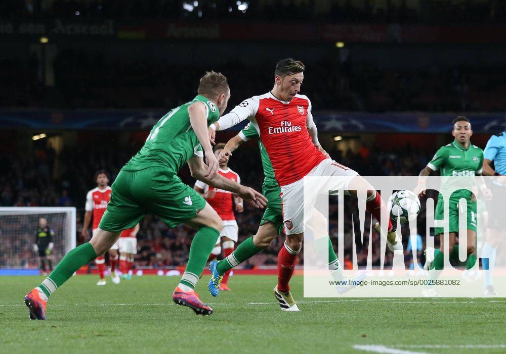 Arsenal s Mesut Ozil scoring his sides sixth goal during the Champions League group A match at the Emirates Stadium, London. Picture date October 19th, 2016 Pic David Klein Sportimage .