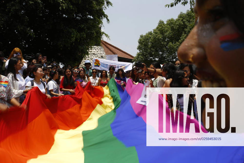 Hundreds of people from the LGBTIQ+ community wave their rainbow flag during Nepalâ€⠢s pride parade month to celebrate their identities in Kathmandu, Nepal on Saturday, June 10, 2023. Joining hands and hearts, Nepal s vibrant LGBTQ+ community and allies come together each year for a spectacular celebration of love, acceptance, and inclusivity during the annual Pride Parade. Photo Kathmandu Nepal - ZUMAg200 20230610_zap_g200_002