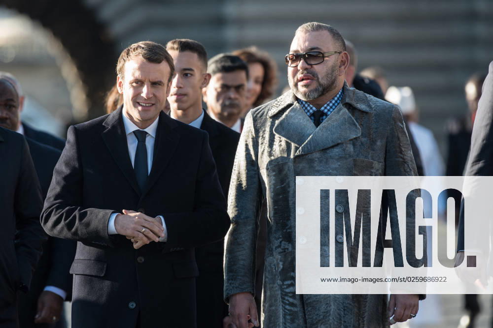 Macron Targeted In Project Pegasus Spyware Case File photo dated December 12, 2017 of French President Emmanuel Macron and King Mohammed VI of Morocco walk to the Mirage boat with other heads of state on their way to the Ile Seguin near Paris during the One Planet Summit in Paris. The phone of French President Emmanuel Macron was targeted for potential surveillance on behalf of Morocco in the Pegasus spyware case. An investigation published on Sunday by 17 media organisations, led by the Paris-based non-profit journalism group Forbidden Stories, said the spyware, made and licensed by Israeli company NSO, had been used in attempted and successful hacks of smartphones belonging to journalists, government officials and human rights activists